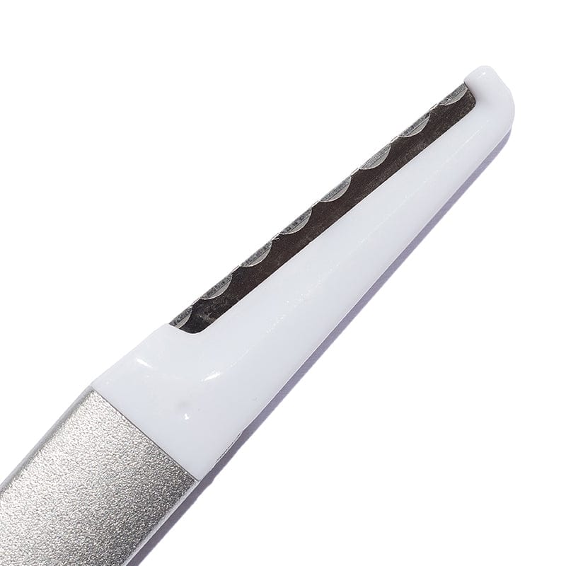 At-home exfoliation tool with stainless steel blade